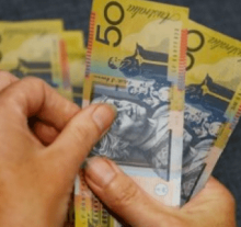 Australia, NZ dollars pause after sharp rally, eyes on RBA